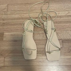 Gold, strappy, flat sandal